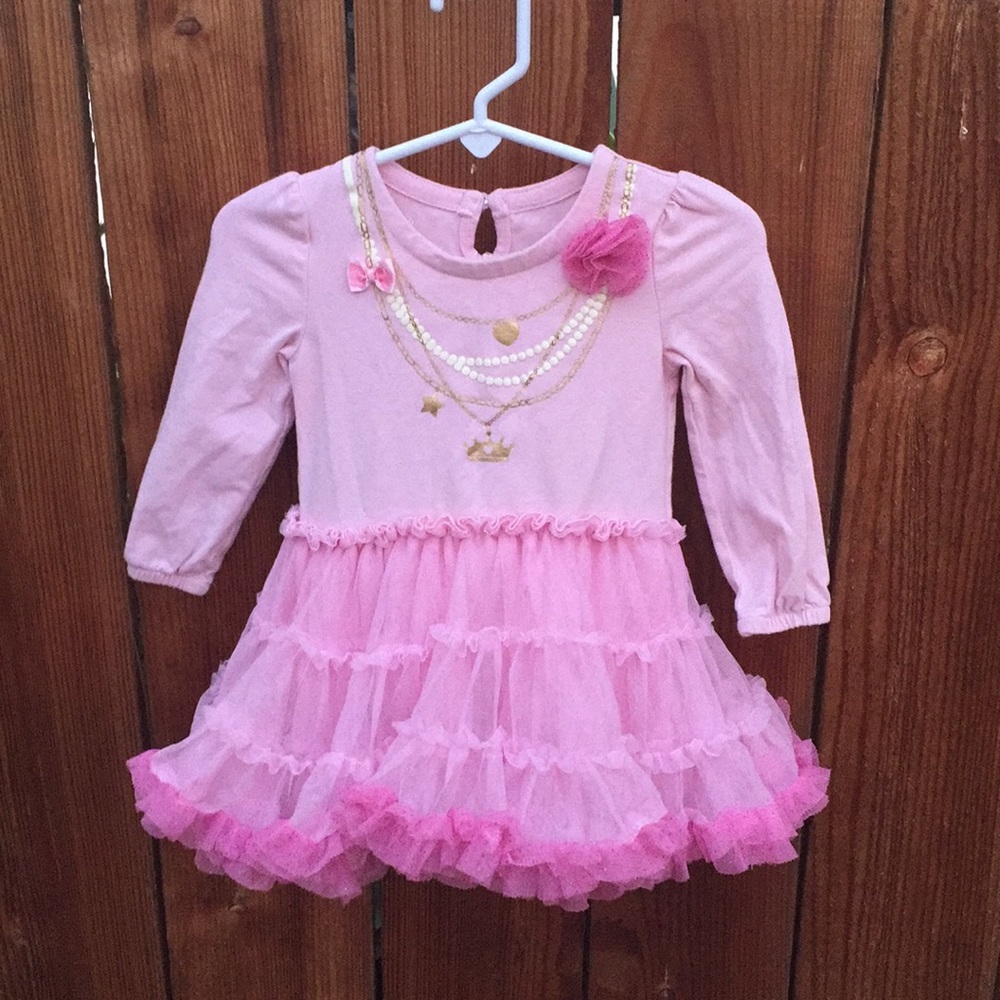 Gorgeous and fun tutu dress with faux jewelry